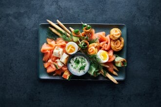 Smoked salmon platter on a table.