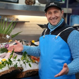 Fishmonger Stéphane Bachelin showing some of the broad seafood selection at Maison Bachelin in Paris 