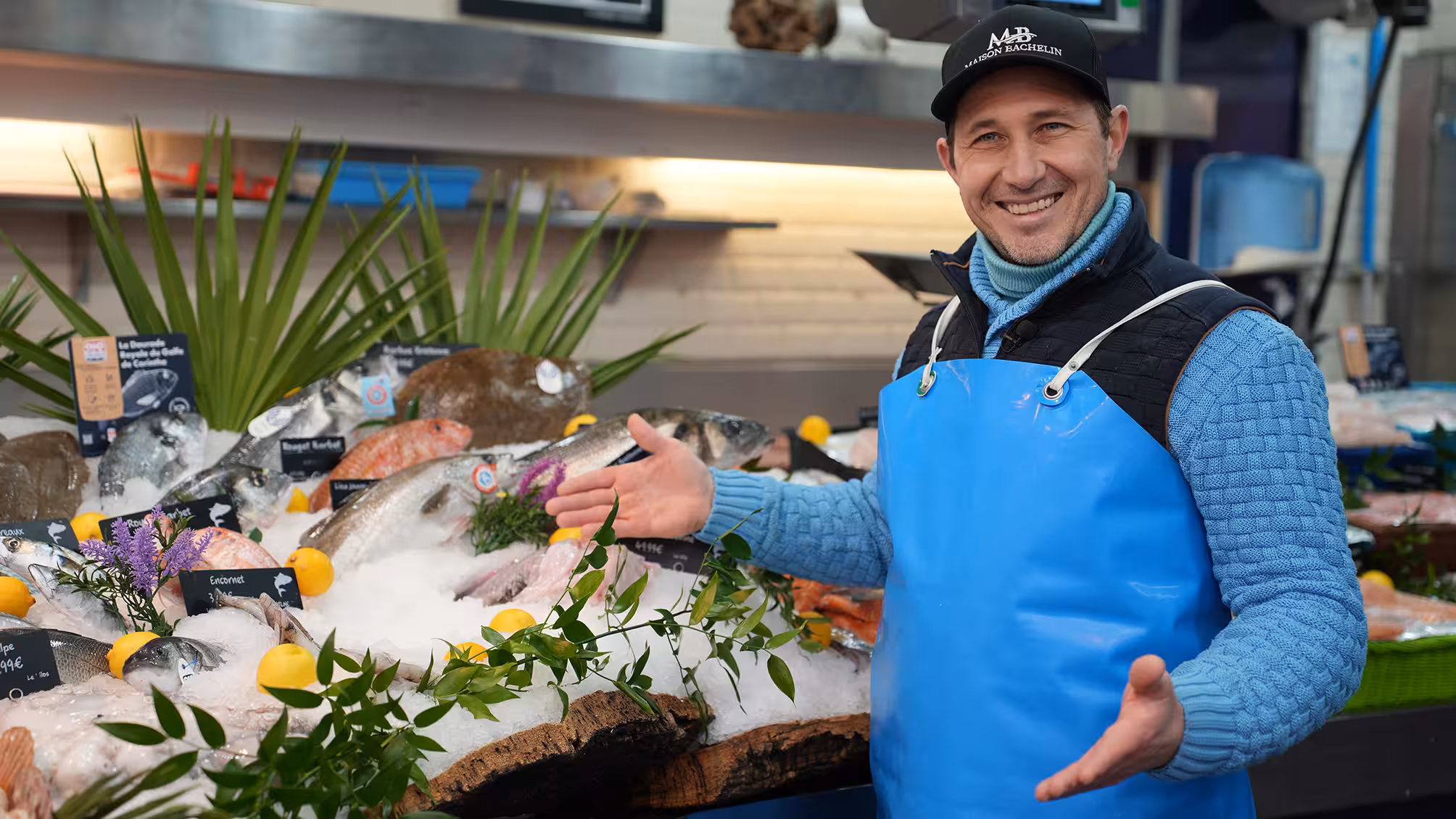 Fishmonger Stéphane Bachelin showing some of the broad seafood selection at Maison Bachelin in Paris