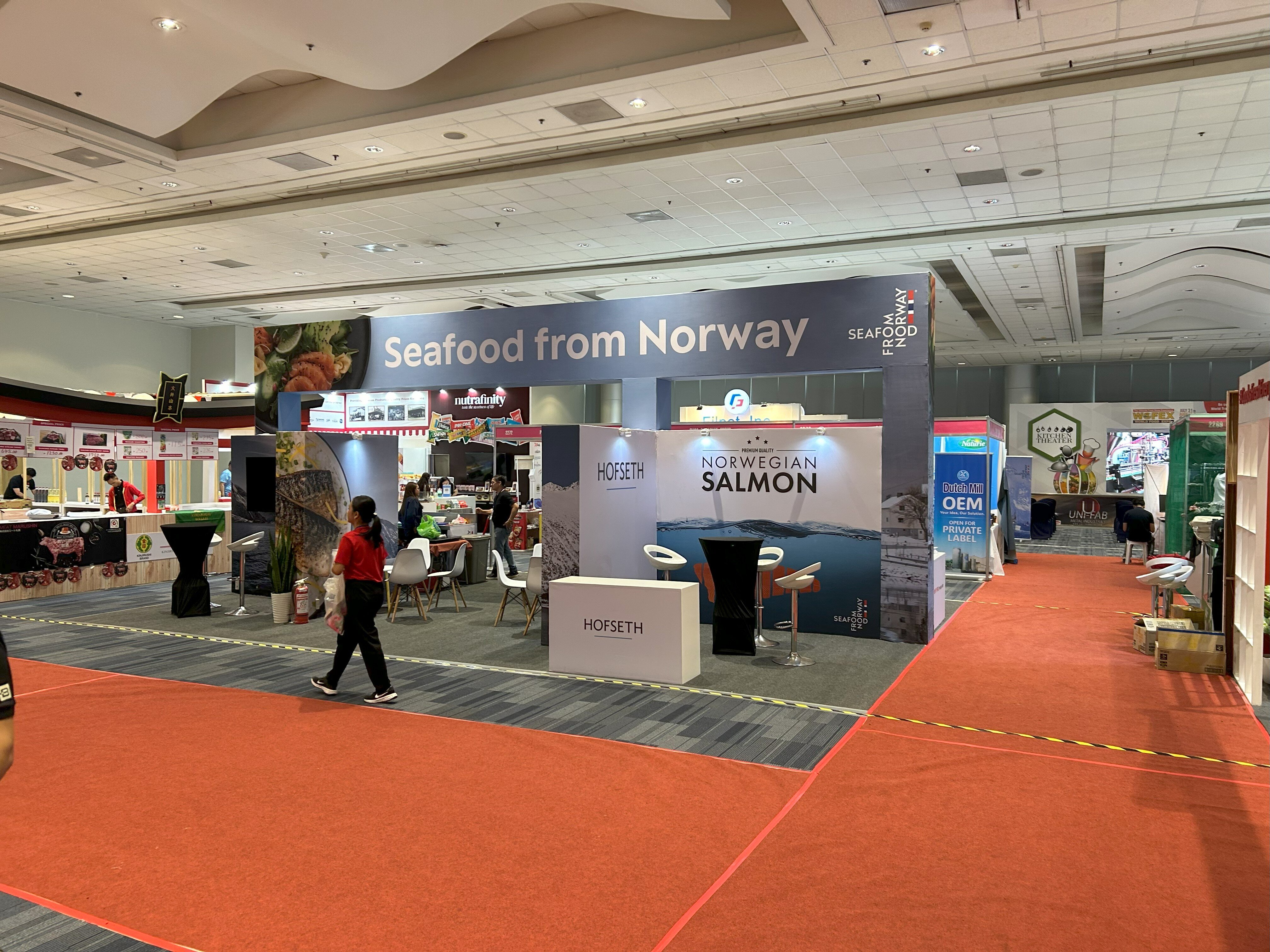 Seafood from Norway expo, a pavilion with high table and chairs